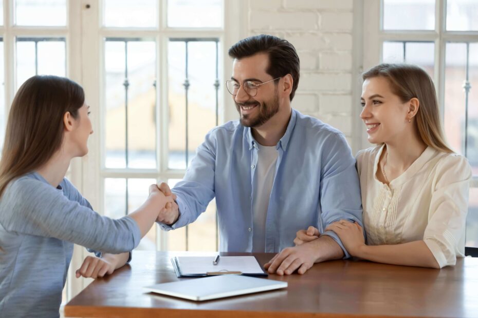 couple meeting with an insurance agent