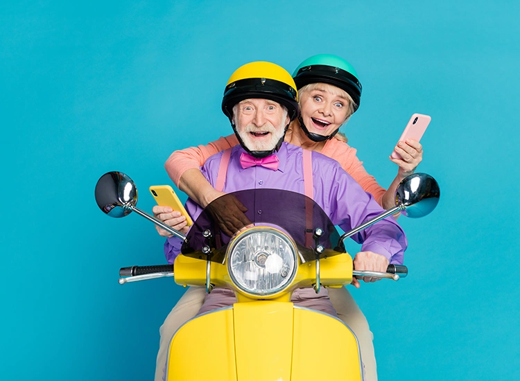 elderly-couple-riding-motorcycle