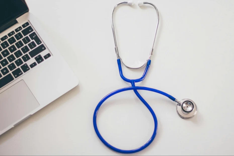 health-insurance-stethoscop- and-a-laptop-on-a-white-desk