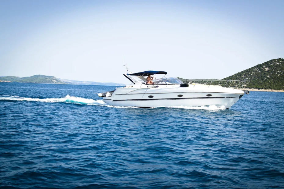 man-driving-speed-boat-in-the-ocean